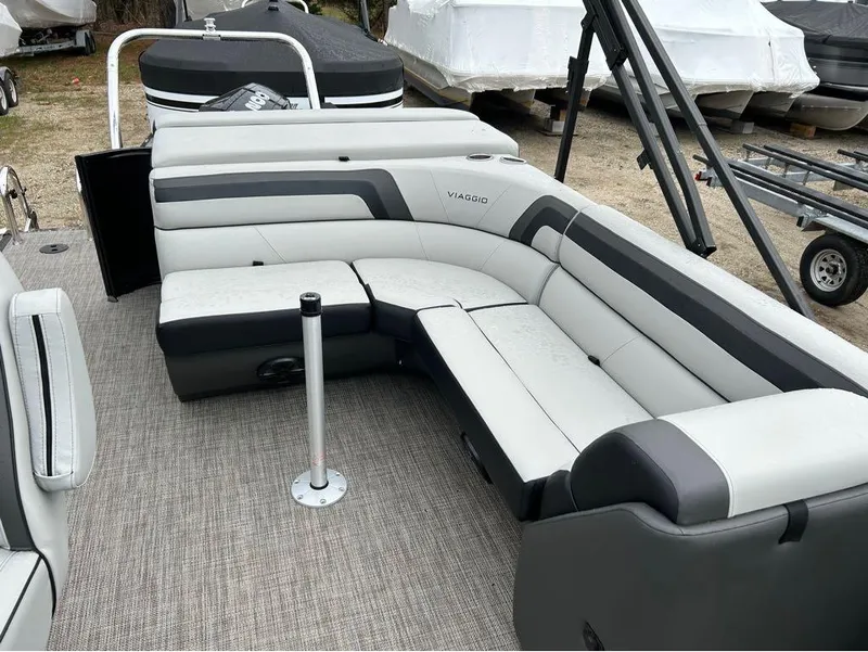 Slide: The Image of 2023 Viaggio Lago L25C pontoon boat with spacious seating and modern design. - 3