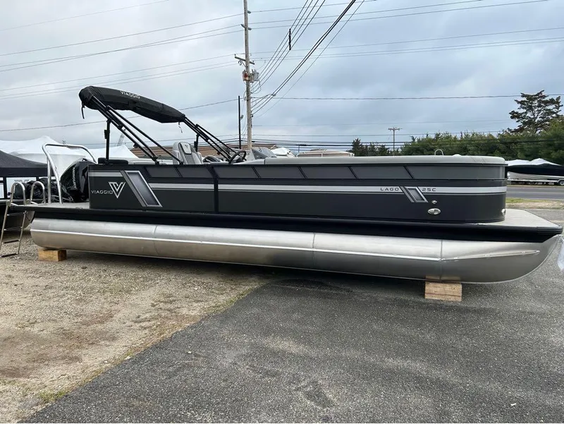 Slide: The Image of 2023 Viaggio Lago L25C pontoon boat in a parking lot. - 4