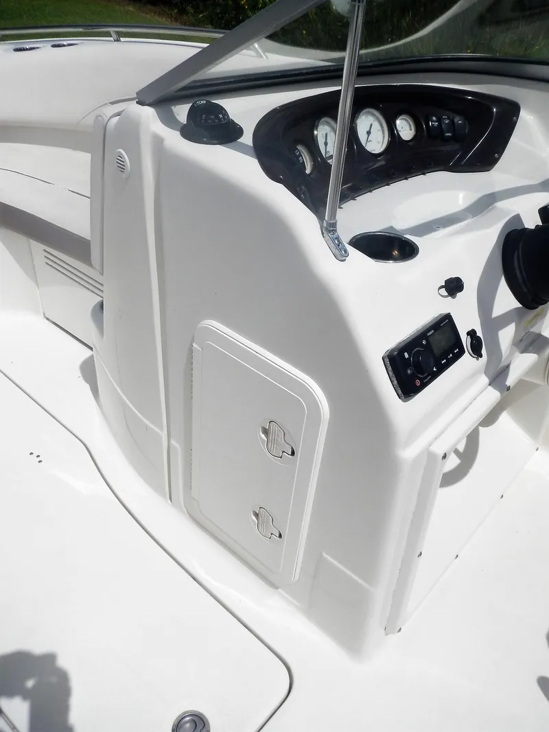 Slide: The Image of 2016 SouthWind 212 SD boat dashboard and control panel. - 15