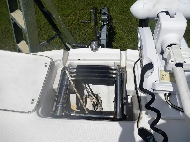 Slide: The Image of 2016 SouthWind 212 SD boat with folded ladder and anchor storage. - 16