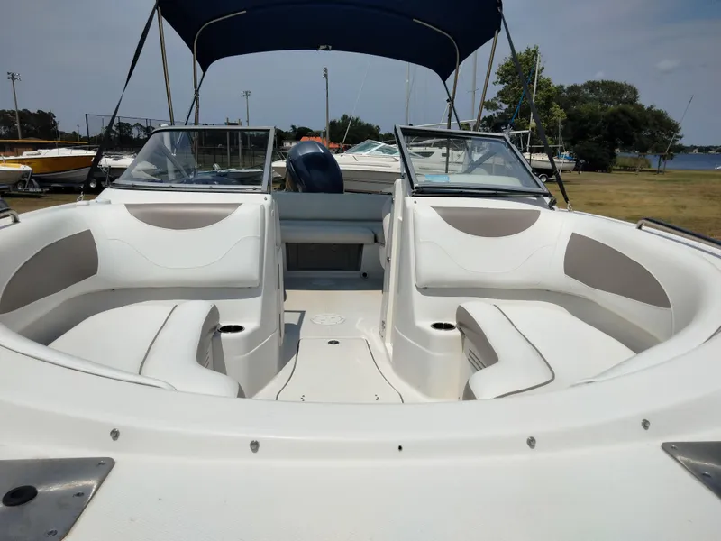 Slide: The Image of 2016 SouthWind 212 SD boat with spacious seating and canopy. - 24