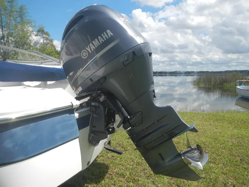 Slide: The Image of 2016 SouthWind 212 SD boat with Yamaha outboard motor by a lake. - 3