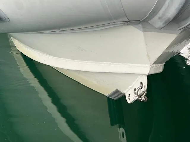 Slide: The Image of 2017 Highfield OM 500 boat hull in water. - 12