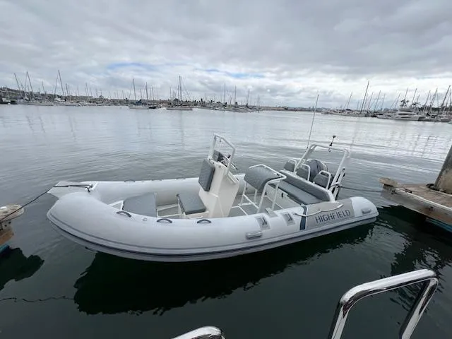 Slide: The Image of 2017 Highfield OM 500 inflatable boat docked in a marina. - 3