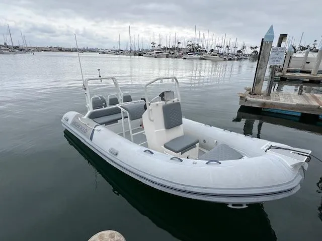 Slide: The Image of 2017 Highfield OM 500 inflatable boat docked in a marina. - 4