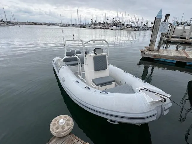 Slide: The Image of 2017 Highfield OM 500 inflatable boat docked at a marina. - 5