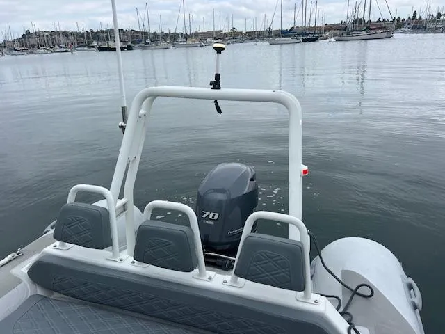 Slide: The Image of Highfield OM 500 boat with Yamaha 70 outboard motor in a marina, 2017 model. - 7