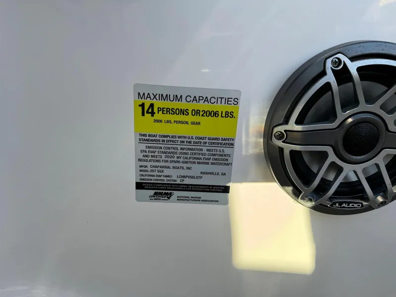 Slide: The Image of Maximum capacity label on 2020 Chaparral 257 SSX boat, 14 persons or 2006 lbs. - 9
