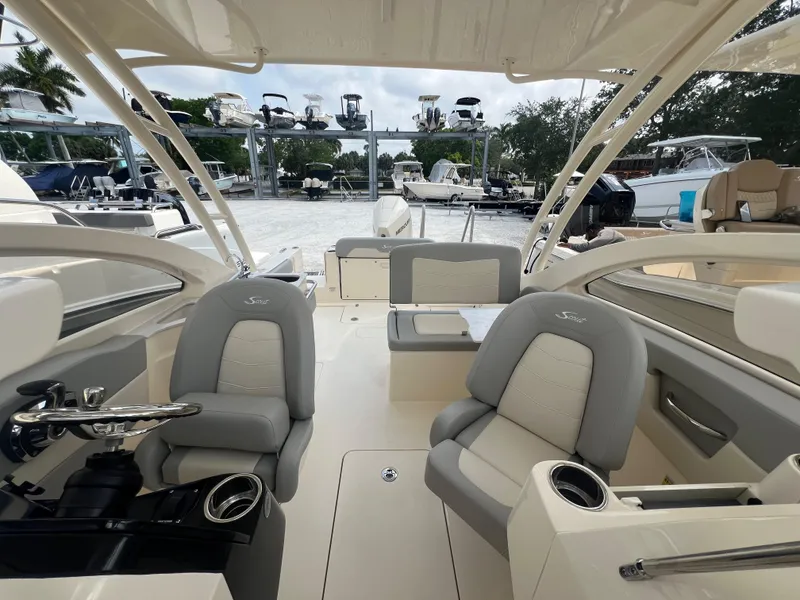 Slide: The Image of 2024 Scout 240 Dorado boat interior with luxurious seating and modern design. - 14