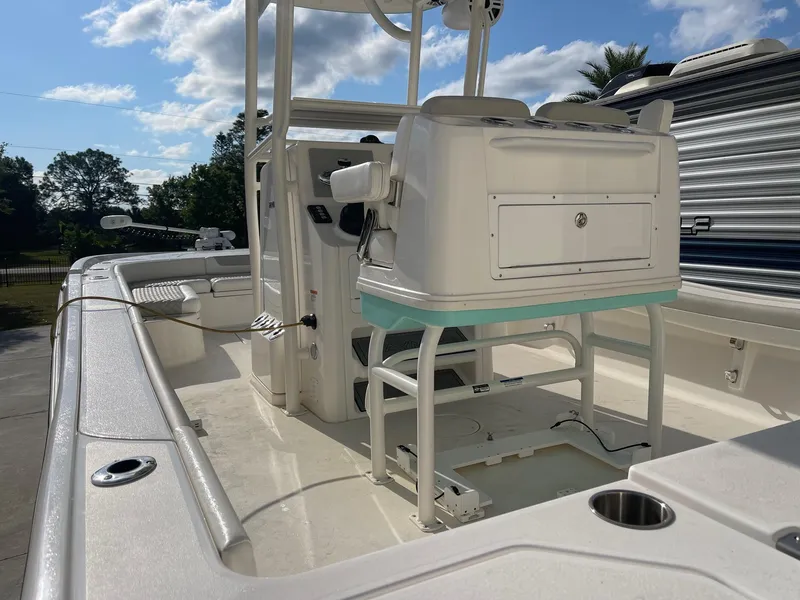 Slide: The Image of 2022 Caymas 28 HB Twin boat interior with helm station and seating. - 6