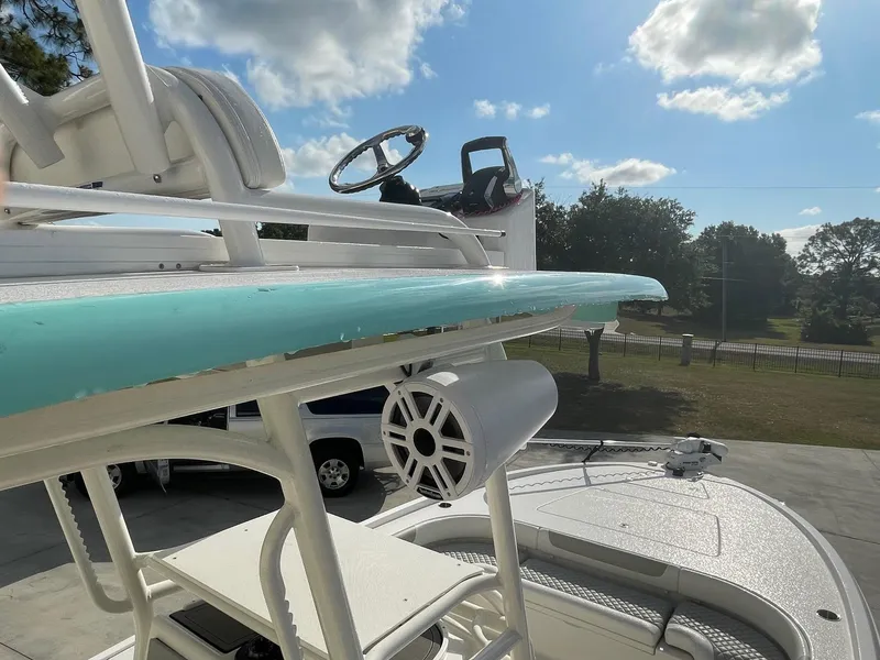 Slide: The Image of 2022 Caymas 28 HB Twin boat with upper deck and speaker system. - 7