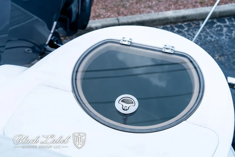 Slide: The Image of 2024 Sea Fox 248 Side Console boat hatch with sleek design and secure latch. - 25