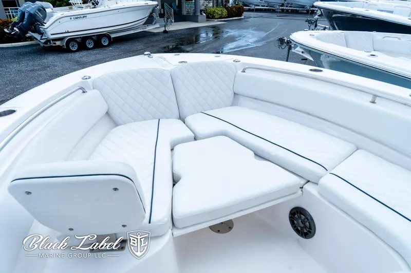 Slide: The Image of 2024 Sea Fox 248 Side Console boat with luxurious white seating. - 9