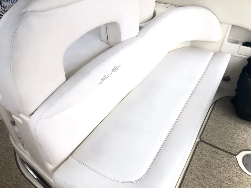 Slide: The Image of White leather seating on a 2002 Sea Ray 360 Sundancer boat. - 17