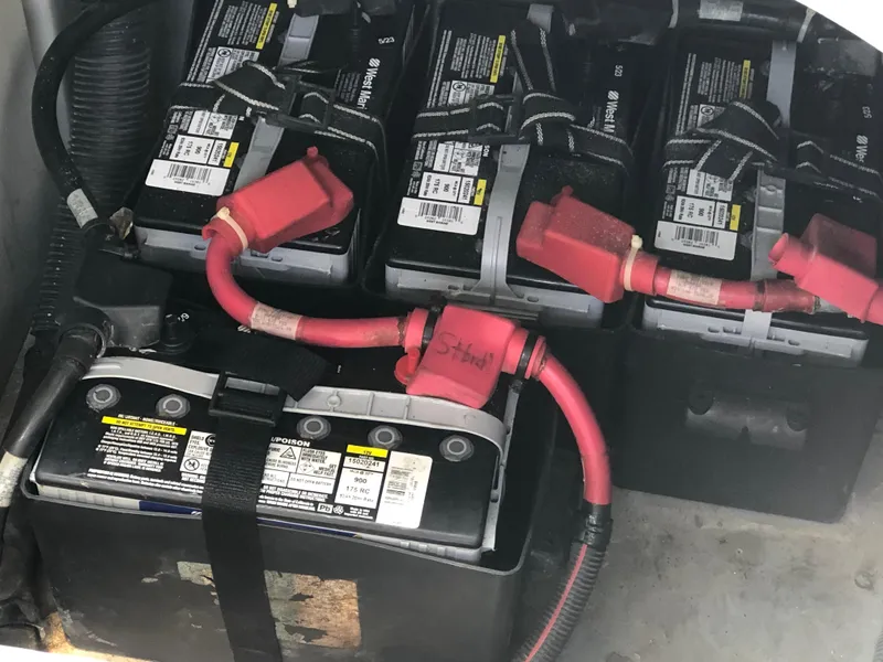Slide: The Image of Battery compartment of a 2002 Sea Ray 360 Sundancer boat. - 46
