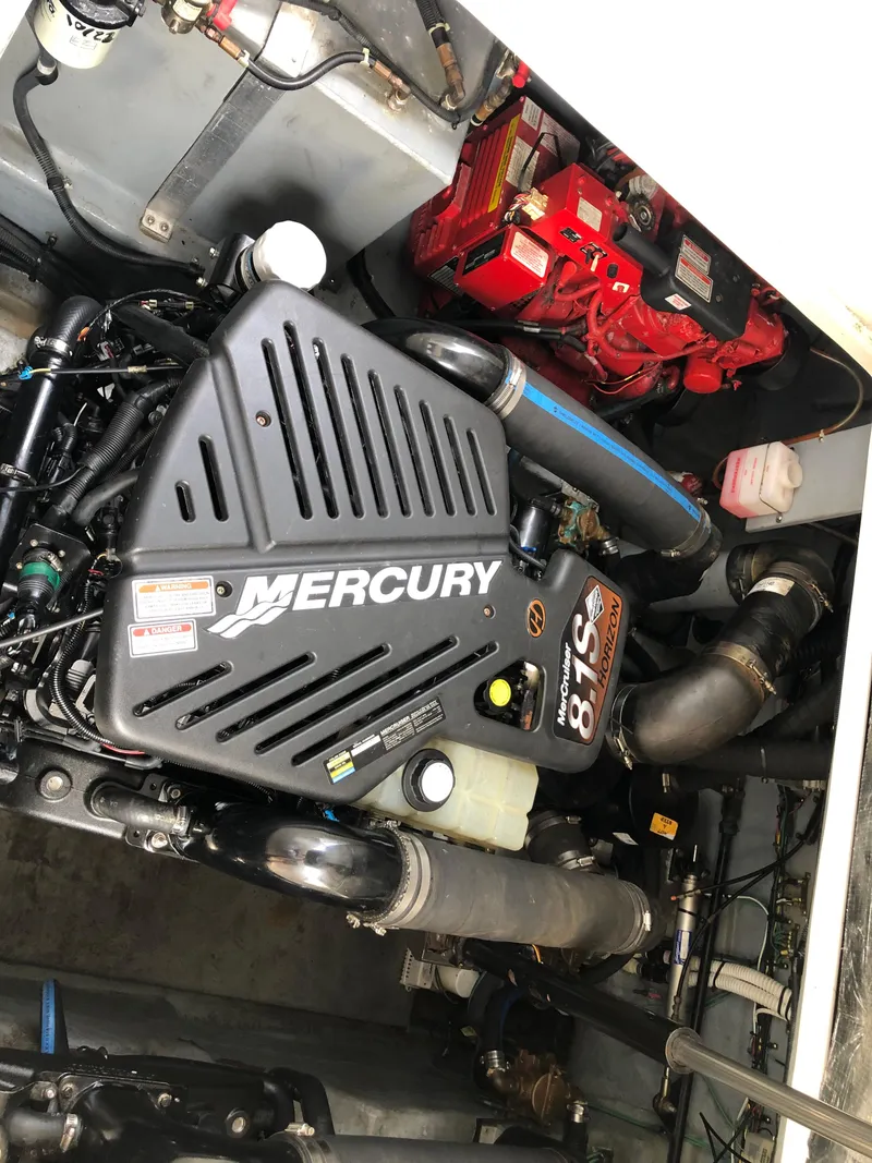 Slide: The Image of 2002 Sea Ray 360 Sundancer engine compartment with Mercury 8.1S engine. - 47