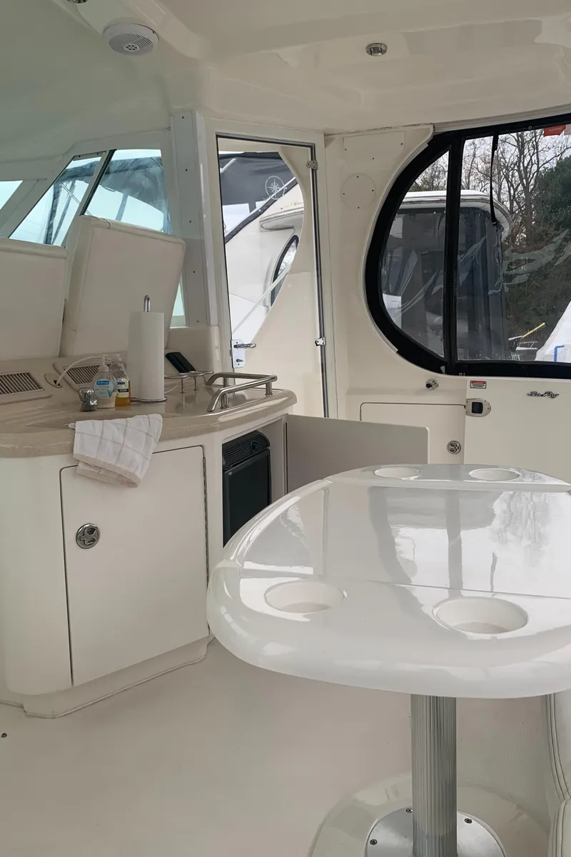 Slide: The Image of Interior of a 2005 Sea Ray 390 Motor Yacht with modern amenities. - 13