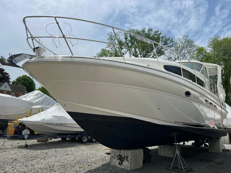 Slide: The Image of 2005 Sea Ray 390 Motor Yacht on dry dock, side view. - 2
