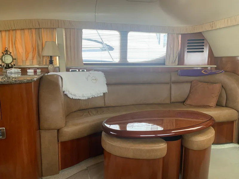 Slide: The Image of Luxurious interior of a 2005 Sea Ray 390 Motor Yacht with plush seating and elegant decor. - 25