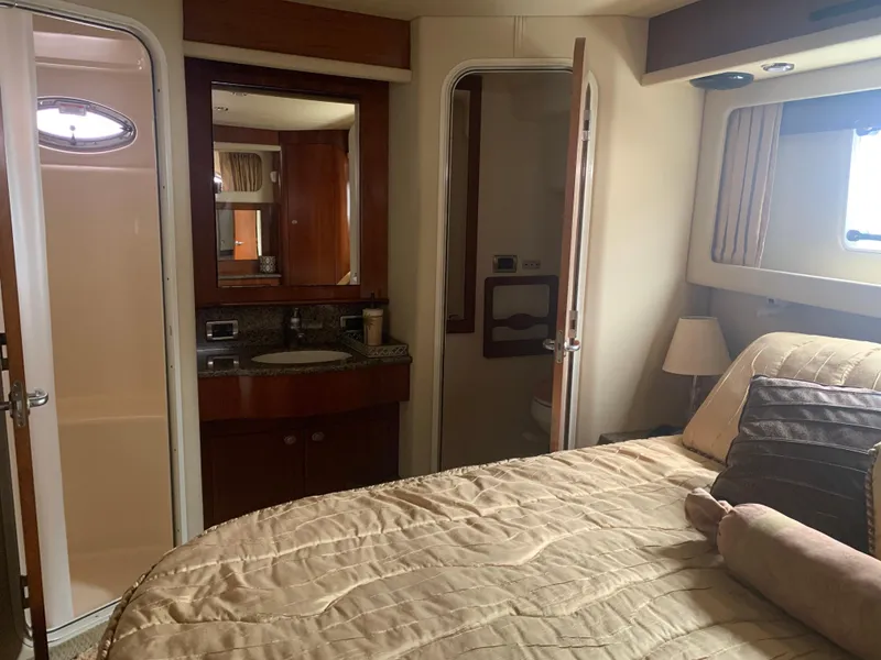Slide: The Image of 2005 Sea Ray 390 Motor Yacht bedroom with ensuite bathroom. - 28
