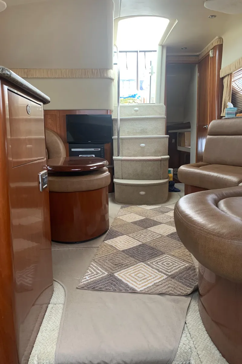 Slide: The Image of Interior of 2005 Sea Ray 390 Motor Yacht with luxurious seating and modern amenities. - 37