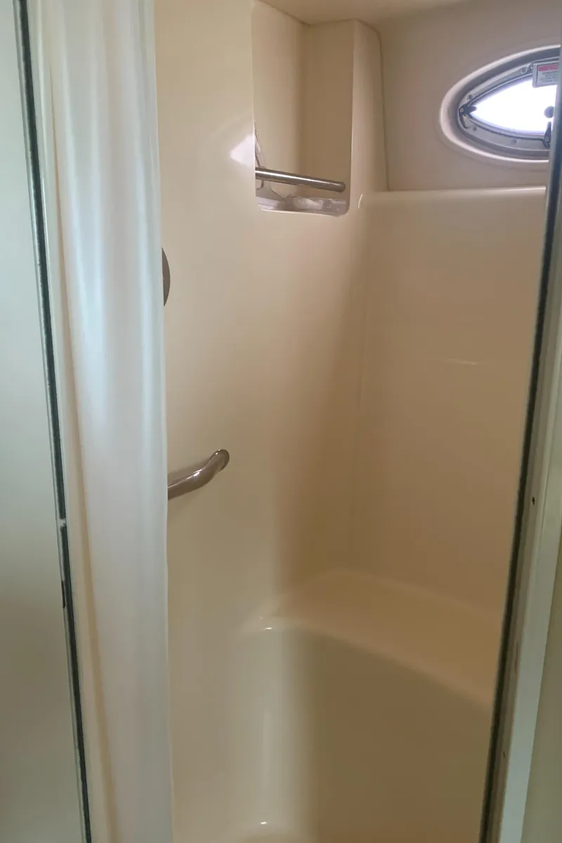 Slide: The Image of Shower area in 2005 Sea Ray 390 Motor Yacht with porthole window. - 39