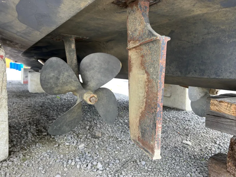 Slide: The Image of Close-up of the propeller and rudder of a 2005 Sea Ray 390 Motor Yacht. - 44