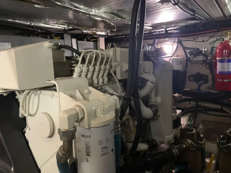 Slide: The Image of Engine room of a 2005 Sea Ray 390 Motor Yacht with visible machinery. - 49