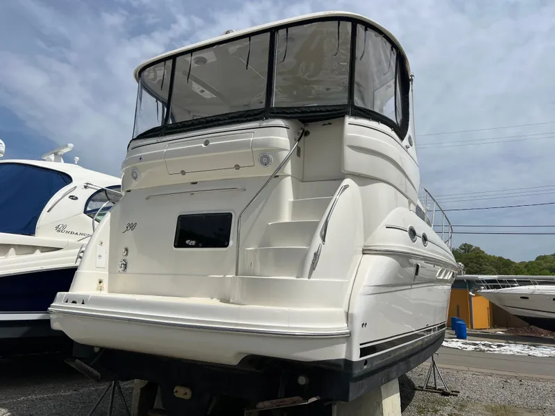 Slide: The Image of 2005 Sea Ray 390 Motor Yacht, rear view, docked on land. - 5