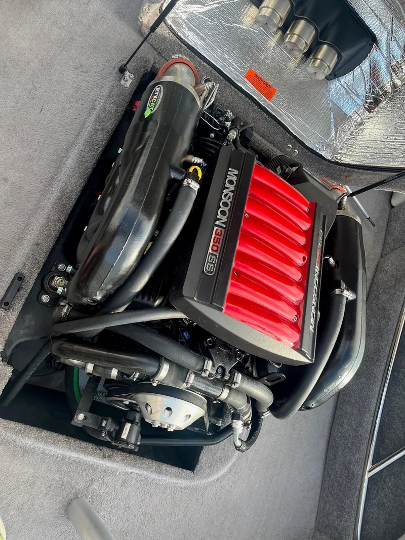 Slide: The Image of 2014 Malibu Response TXi Monsoon 350 engine in boat compartment. - 11