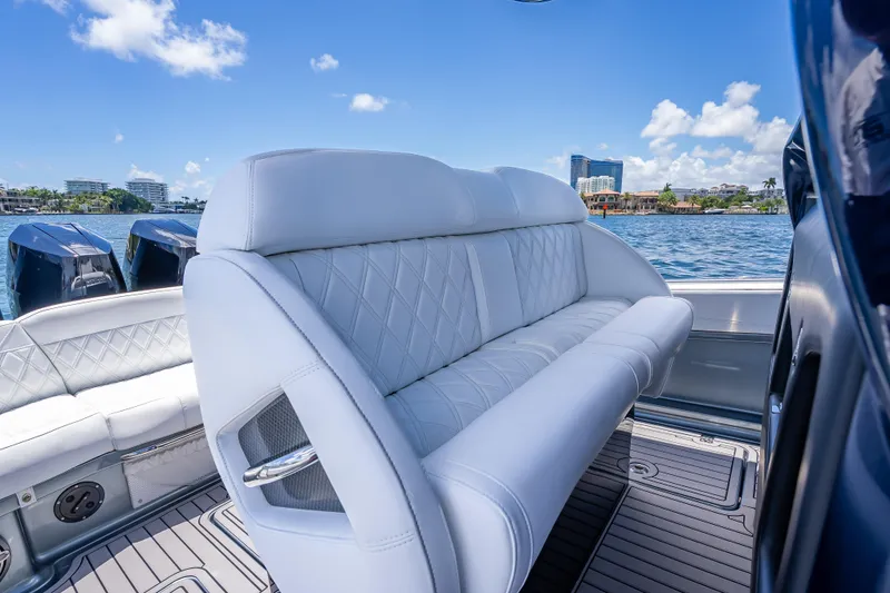 Slide: The Image of 2024 Nor-Tech 400 Supersport luxury seating with ocean view and modern design. - 48