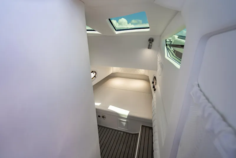Slide: The Image of 2024 Nor-Tech 400 Supersport cabin interior with skylights and modern design. - 53