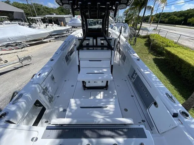 Slide: The Image of 2023 Blackfin 302CC center console boat interior with seating and storage compartments. - 12