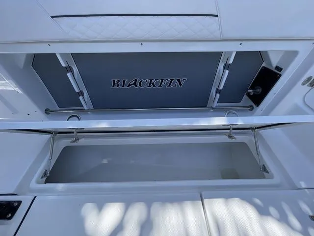 Slide: The Image of 2023 Blackfin 302CC boat storage compartment. - 23