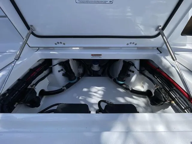 Slide: The Image of 2023 Blackfin 302CC boat engine compartment with open hatch. - 26