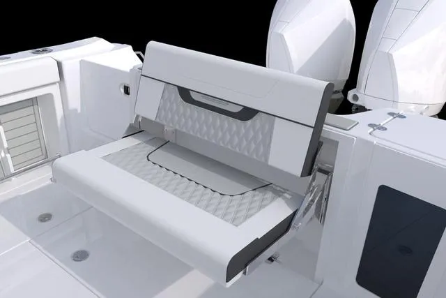 Slide: The Image of 2023 Blackfin 302CC boat with foldable rear seating and dual outboard engines. - 48