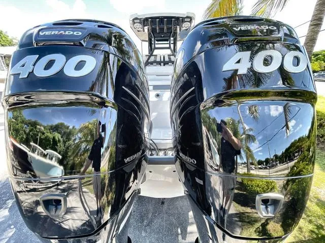 Slide: The Image of 2023 Blackfin 302CC with twin 400 Verado engines. - 9