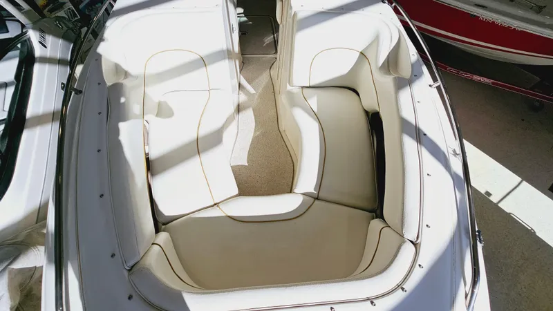 Slide: The Image of 2000 Sea Ray 260 Bow Rider with spacious seating area. - 14