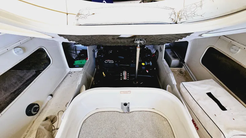 Slide: The Image of Engine compartment of a 2000 Sea Ray 260 Bow Rider boat. - 17