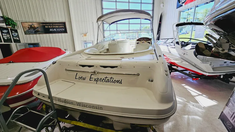 Slide: The Image of 2000 Sea Ray 260 Bow Rider boat in showroom, named Loew Expectations, Hudson, Wisconsin. - 3