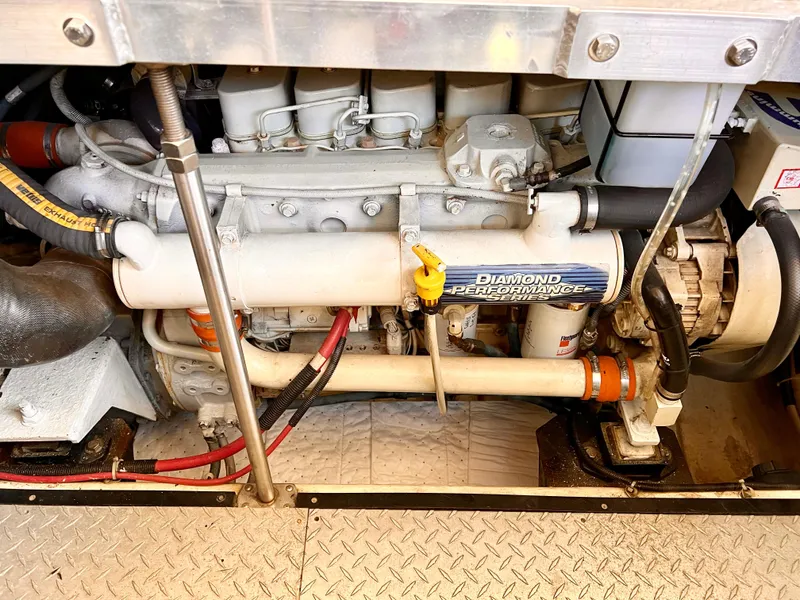 Slide: The Image of Engine compartment of a 2002 Carver 396 Motor Yacht with Diamond Performance components. - 27