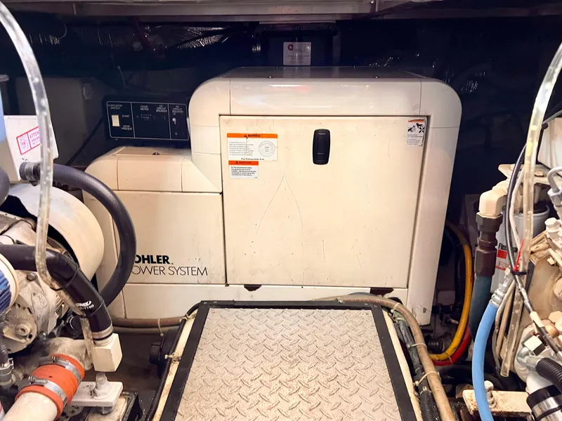 Slide: The Image of Engine room of a 2002 Carver 396 Motor Yacht with Kohler power system. - 30