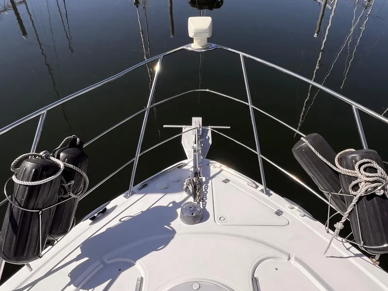 Slide: The Image of Bow of 2002 Carver 396 Motor Yacht with anchor and fenders. - 6