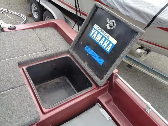 Slide: The Image of 1987 Venture Bass Boat 18 storage compartment with Yamaha outboard motor branding. - 17