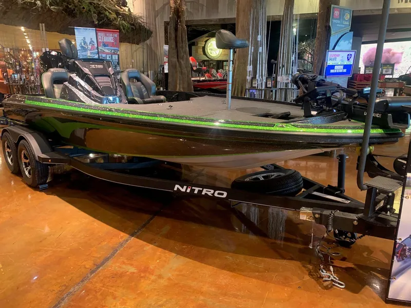 Slide: The Image of 2024 Nitro Z19 Pro boat displayed indoors, featuring sleek design and modern features. - 0