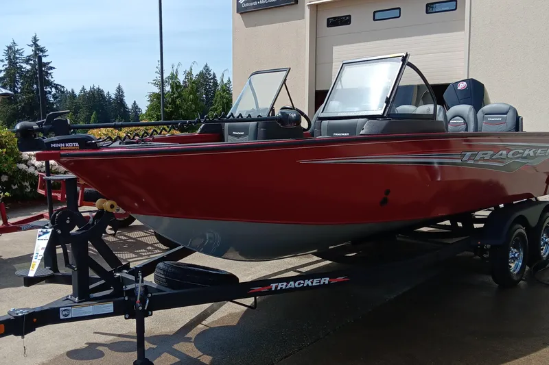 The Image of 2024 Tracker Targa V-19 Combo boat in red on a trailer. - 0