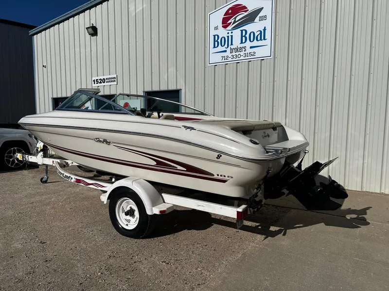 Slide: The Image of 2000 Sea Ray 185 Bow Rider boat on trailer at Boji Boat Brokers. - 11