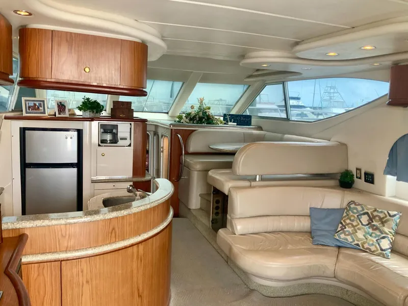 Slide: The Image of Luxurious interior of a 1998 Maxum 4600 SCB yacht with modern amenities. - 10