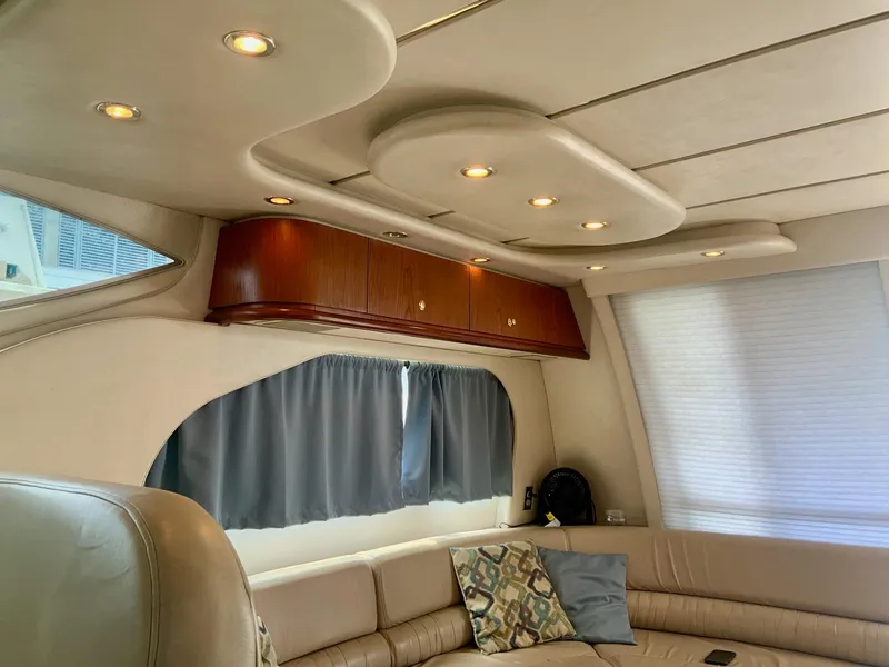 Slide: The Image of Luxurious interior of 1998 Maxum 4600 SCB yacht with elegant seating and modern lighting. - 14