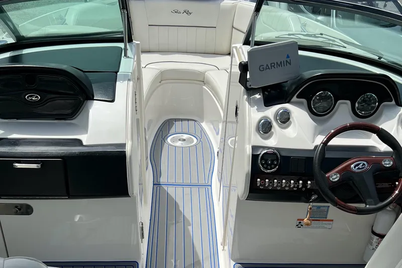 Slide: The Image of 2007 Sea Ray 250 SLX boat interior with Garmin navigation system. - 4